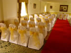 White Chair Cover with Gold Organza Sash